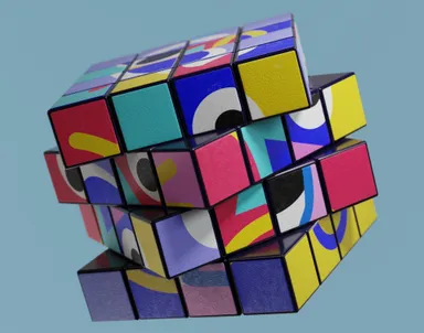 A photo by Luke Jones of a complicated Rubik's cube with patterns as well as colours
