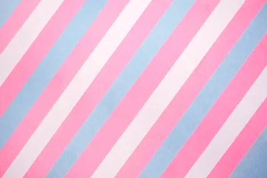 An illustration by Katie Rainbow of diagonal stripes in the colours of the trans pride flag